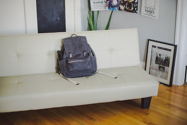 everlane backpack sitting on couch