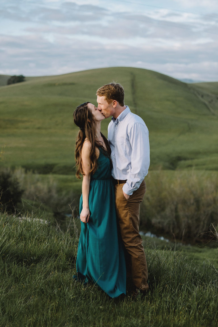 Green rolling hills engagement photo